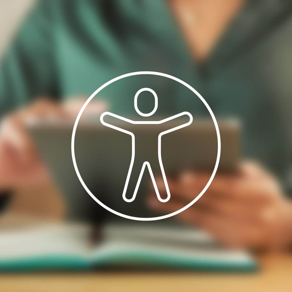 A symbol of a human with outstretched arms in a circle over a blurred image of a person holding a tablet.