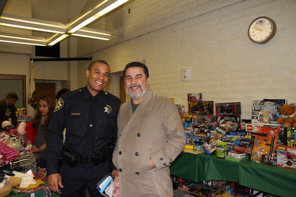 Mark Duarte and cop take a photo together