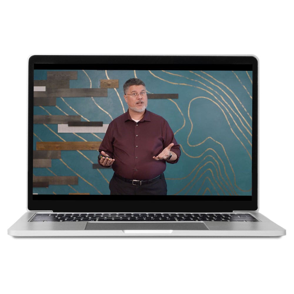 A man on a laptop screen leads a presentation.