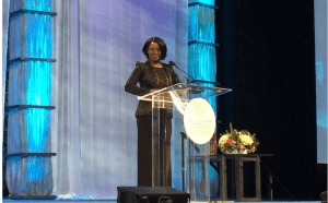 watermark conference for woman speaker on stage